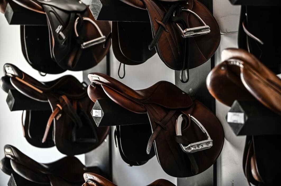 Saddles racked in the Zeppelin Farms tack room