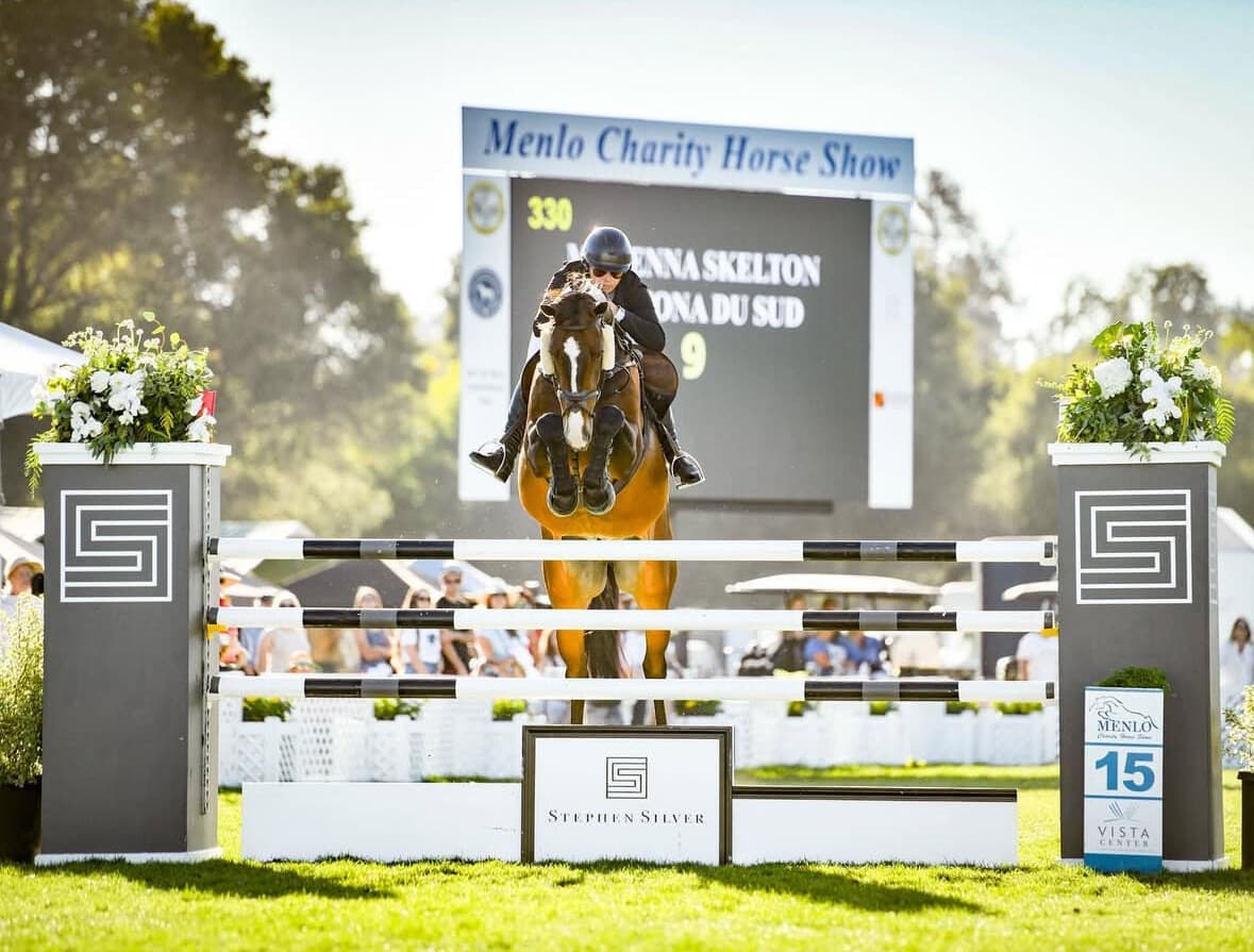 McKenna Skelton and Daytona Du Sud clearing an oxer at the Menlo Charity Horse Show